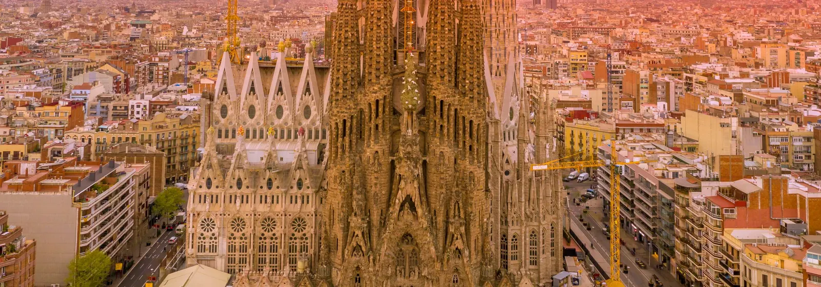 The Sagrada Família and Barcelona at sunset, from the air